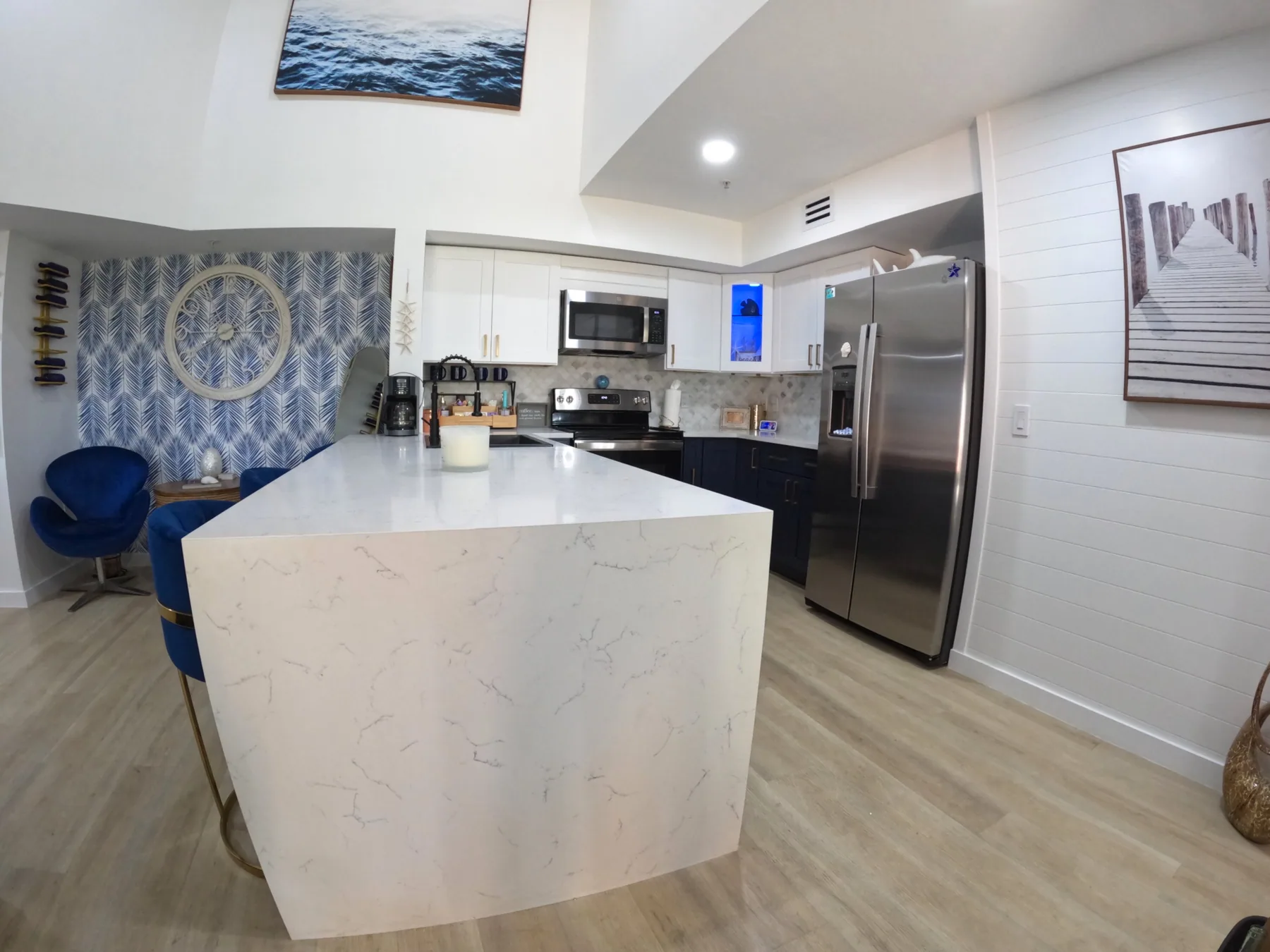 Fresh groceries unpacked in the kitchen fridge at Royal Palm Retreat, complimentary delivery for monthly rentals in Naples